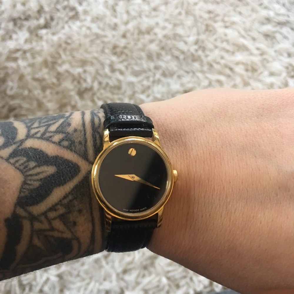 Black and Gold Movado Watch